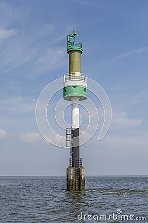 Green harbor entrance buoy Stock Photo