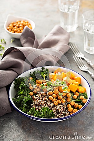 Green and healthy grain bowl with roasted chickpeas Stock Photo