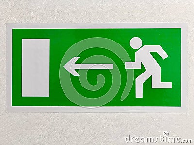 Green Indoor Exit Direction Sign Editorial Stock Photo