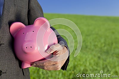 Green Investment Pink Piggy Bank Stock Photo