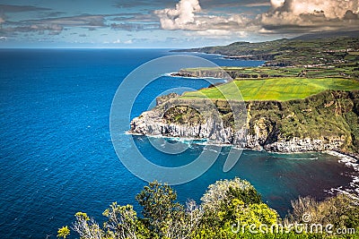 Green island in the Atlantic Ocean, Sao Miguel, Azores, Portugal Stock Photo