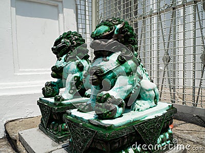 Green jade is Stone Lion Statue Stock Photo