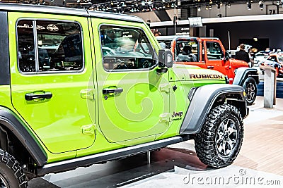 Green Jeep Wrangler Rubicon at Brussels Motor Show, four-wheel drive off-road vehicle manufactured by Jeep Editorial Stock Photo