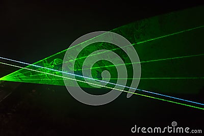 Green laser beams Stock Photo