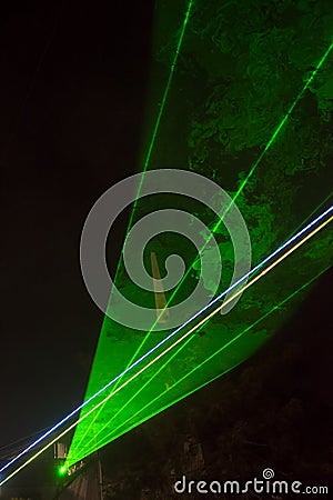 Green laser beams Stock Photo