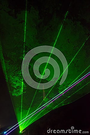 Green laser beams Stock Photo