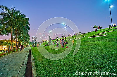 Green lawn of Inya lake park in Yangon, Myanmar Editorial Stock Photo