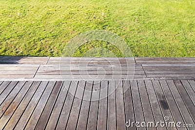 Green lawn pattern / Green grass natural background and old wood Stock Photo