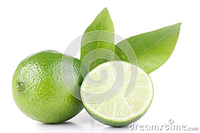 Green lemon and leaves Stock Photo