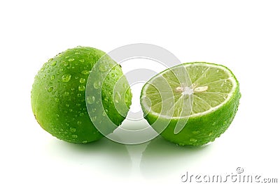 Green lemon with water droplets Stock Photo