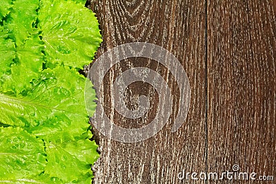 Green lettuce salad leafs on wooden Stock Photo