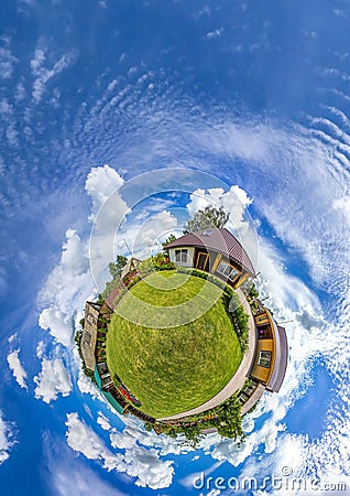 Green little planet panorama with architecture, soft blue sky and white clouds. Buildings at summer. Planet Earth. Stock Photo