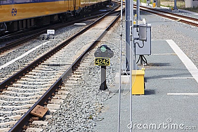 Green low sign light along the rails at Zwolle train station Editorial Stock Photo
