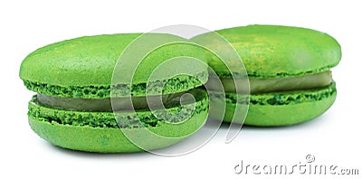 Green macarons on white background. Delicious dessert Stock Photo