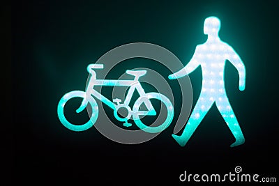 Green man go pedestrian traffic light Stock Photo