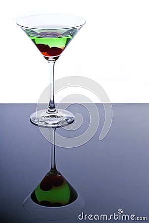 Green Martini with Maraschino Cherries Stock Photo