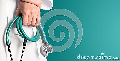 Green medical background with nurse Stock Photo