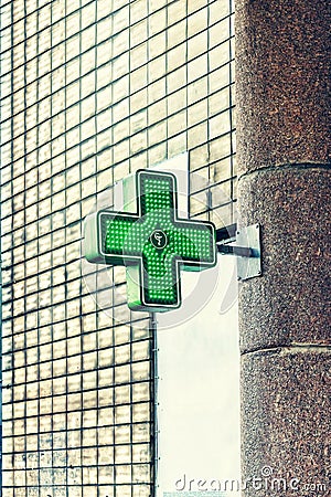 Green medical cross, Pharmacy Neon Sign. Drug store. Pharmacy concept, medicine, symbol, Stock Photo