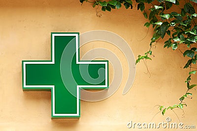 Green medical cross sign Stock Photo