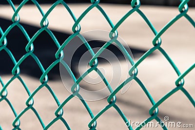 Green metal chain link fence background Stock Photo
