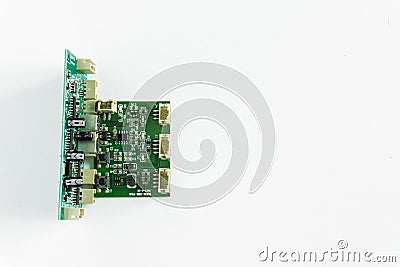 Green motherboard with transistors on a white background Stock Photo