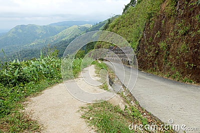 Green Mountain and road in Thailand Stock Photo