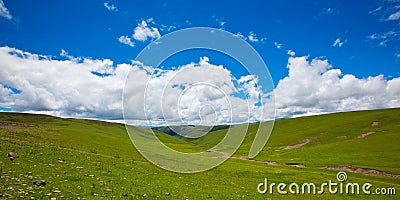 Green mountain, white cloud and blue sky Stock Photo