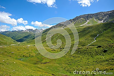 Green mountains in the Alps Stock Photo