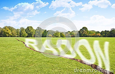 A green mowed lawn with a diagonal crack with radon gas escaping - concept image with copy space Stock Photo