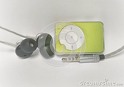 Green mp3 player with a earphone and audio jack Stock Photo