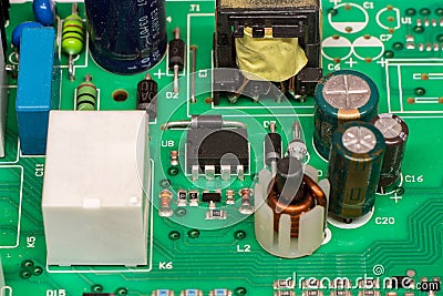 Green multi layer printed electronic circuit board with microcontroller Stock Photo