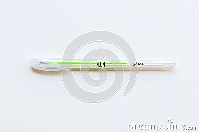 Green neon gel pen on white paper copy space Stock Photo