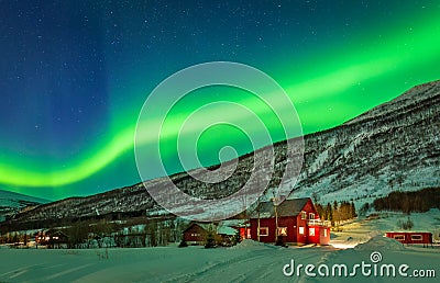 Green northern lights over rural county of northern Norway Stock Photo