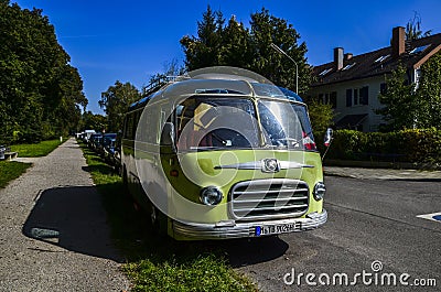 Green old classic retro bus Setra S6 the on the city street of Munich Editorial Stock Photo