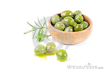 Green olives and aromatic herbs isolated on white background. Stock Photo