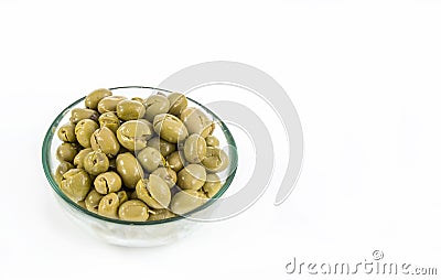 Green olives served in a bowl Stock Photo