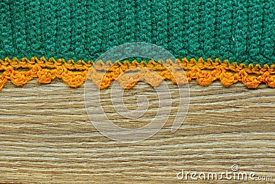 Green orange crocheted textile background Stock Photo