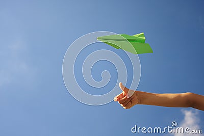 Green paper airplane Stock Photo