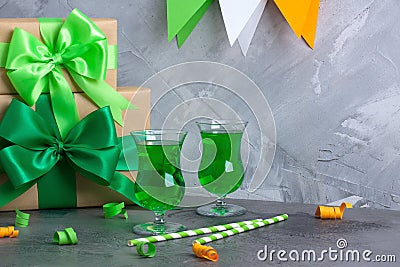 Green party beverages in irish glasses and bottle Stock Photo