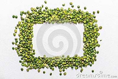 Green peas beautifully laid out on a white background. Top view. rectangular copy space. Vegetarian food Stock Photo