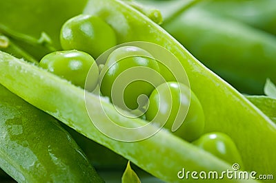 Green peas bright juicy and delicious shot close-up on a white background Stock Photo