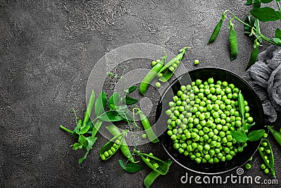 Green peas with pods and leaves Stock Photo