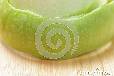 Green peeled apple closeup Stock Photo