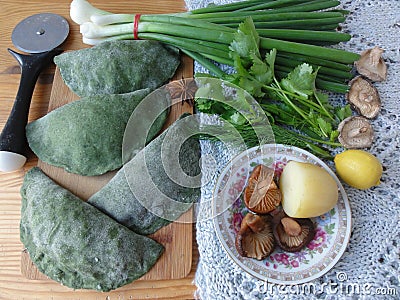 Green pies, dough cooked from nettle Stock Photo