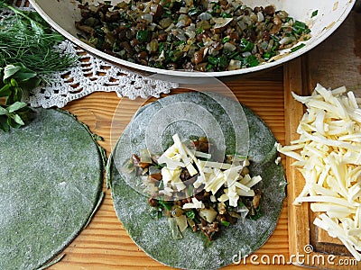 Green pies, dough cooked from nettle Stock Photo