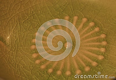 Green pinwheel pottery background Stock Photo