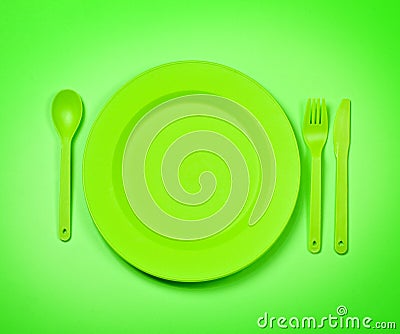 Green plastic disposable tablewar Stock Photo