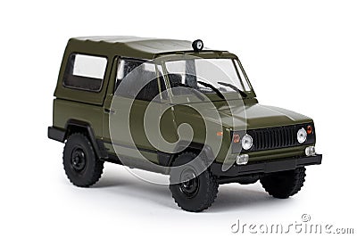 Green plastic toy SUV vehicle, offroad truck, military car, 4x4 auto. Isolated on white background Stock Photo