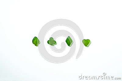 Green playing cards symbols against a white background Stock Photo