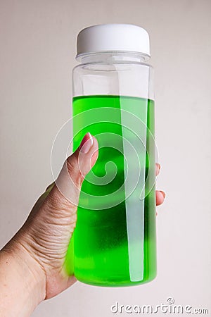 Green protein shake in bottle Stock Photo